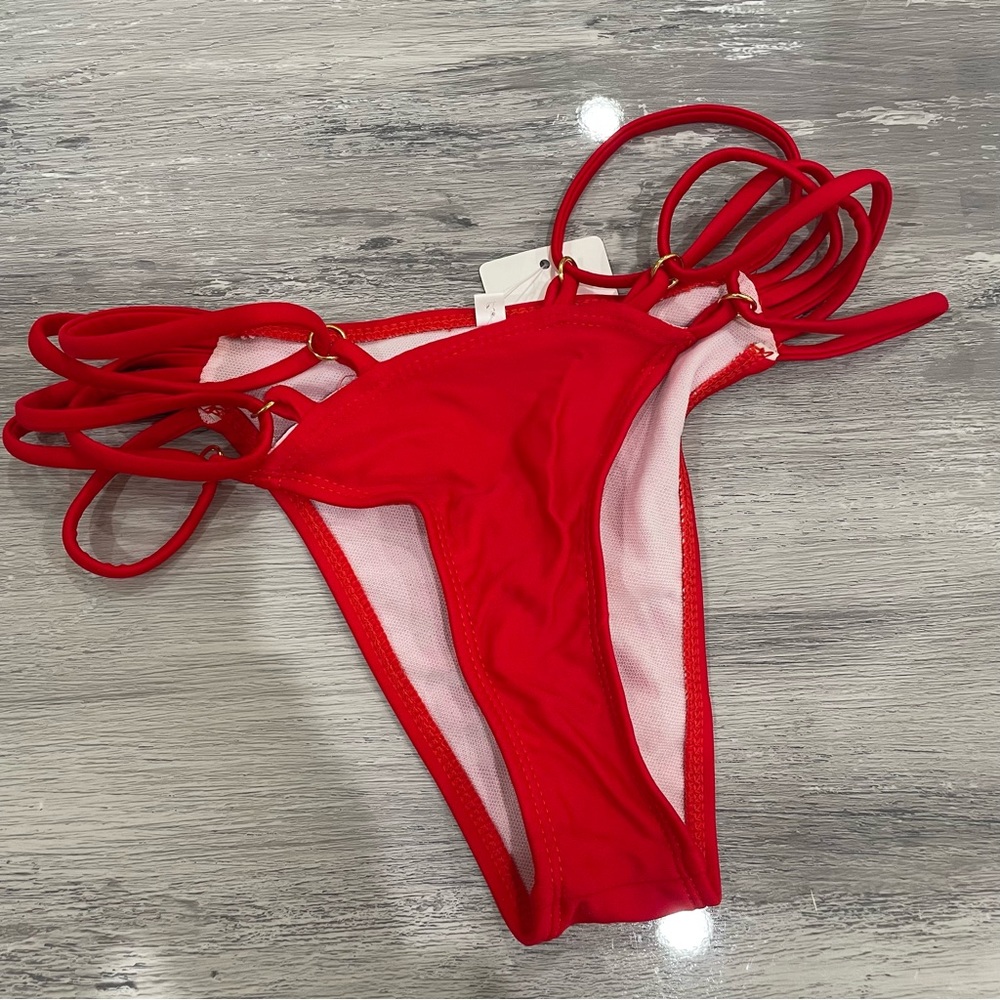 NWT Red Mid coverage bikini bottom with strappy side details/gold hardware